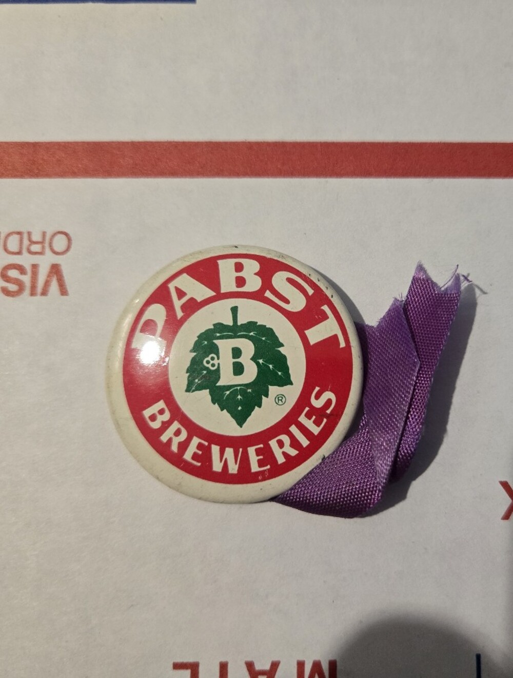 Pabst Breweries Round Logo Button Pin - White/Red/Green with Purple Ribbon